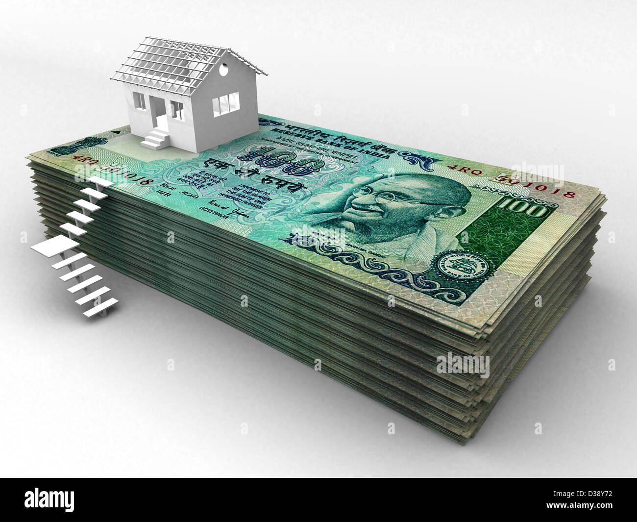 Casa sulla parte superiore della pila di centinaia di rupie banconote Foto Stock