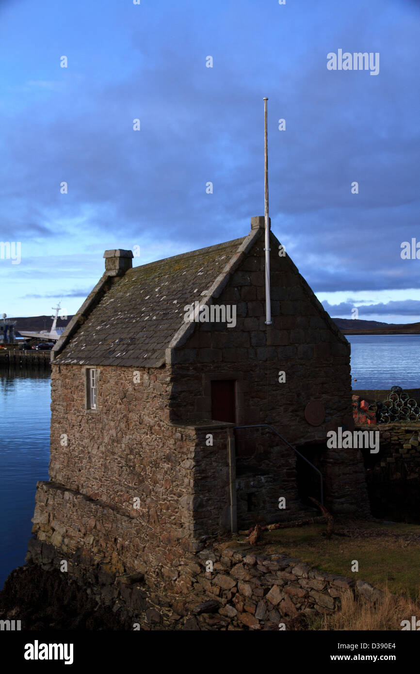Il piccolo molo House Museum, un ex böd o deposito a Symbister su Whalsay, Isole Shetland Foto Stock