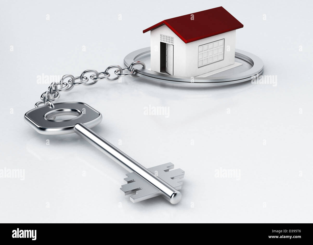 Modello di casa circondata da anello chiave su sfondo bianco Foto Stock