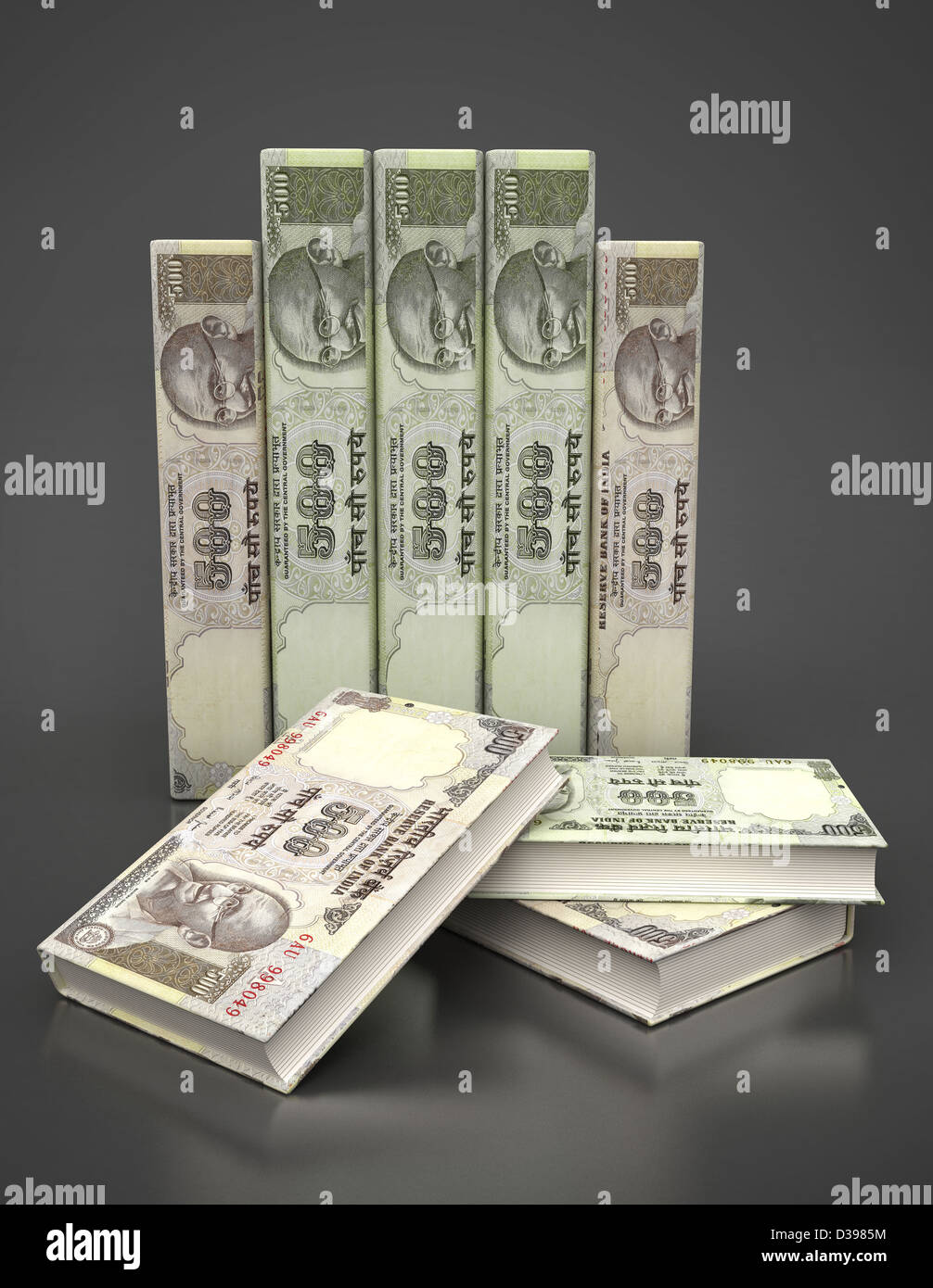 Le copertine dei libri di valuta indiana che rappresentano il prestito di istruzione Foto Stock
