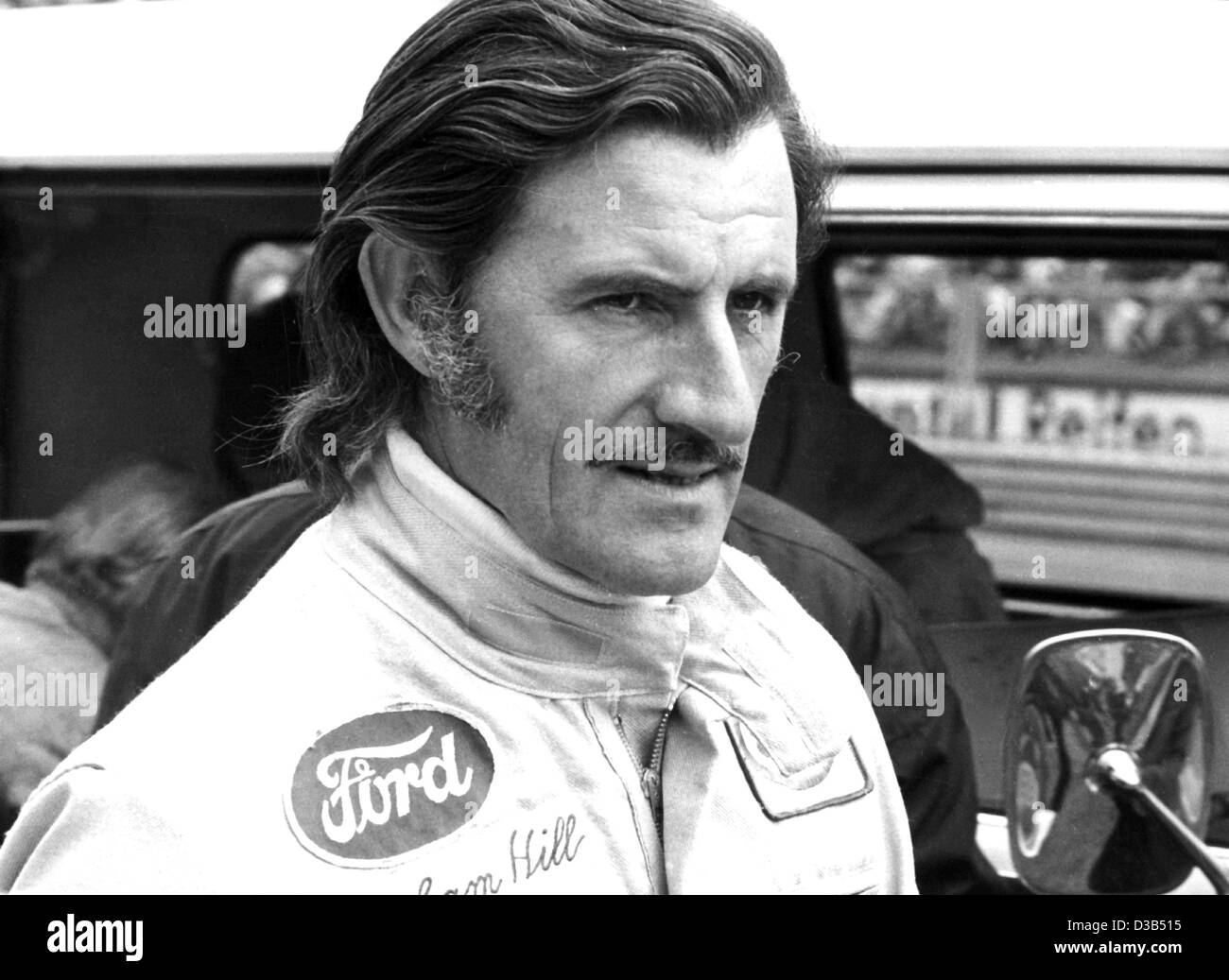 (Dpa file) - British motor gara del pilota Graham Hill raffigurato in vista del Gran Premio di Germania sul Nuerburgring racing corte, Germania Ovest, 29 luglio 1972. Hill ha vinto il campionato di Formula Uno titolo nel 1962 e 1968, ed è il padre del British Formula 1 pilota Damon Hill. Egli era nato il 15 Febru Foto Stock