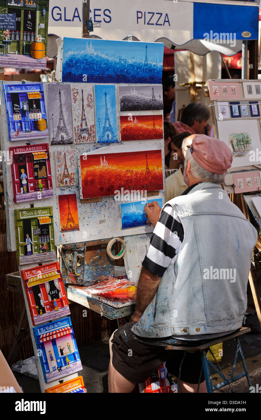 Artista al lavoro in 'Artist quarti " a Montmartre, Paris, Francia. Foto Stock