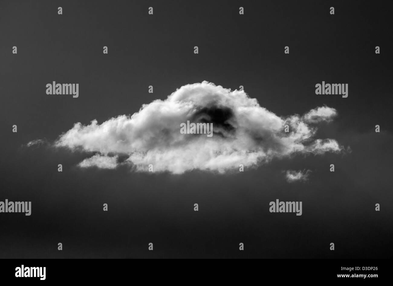 Cumulus cloud con una faccia Foto Stock