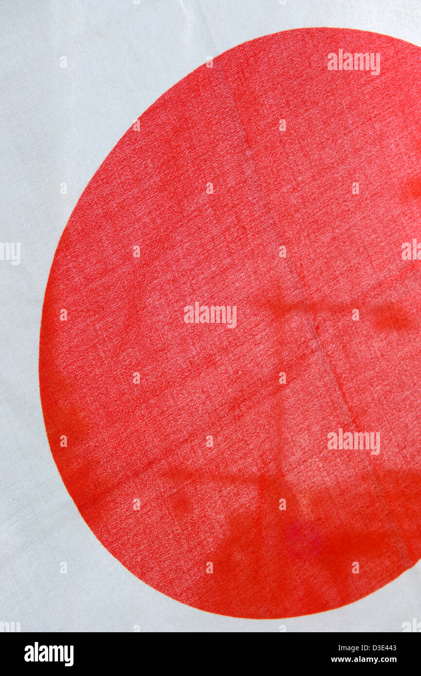 La bandiera giapponese è noto come la hinomaru o un cerchio del sole o RISING SUN. Un disco rosso contro uno sfondo bianco. Foto Stock