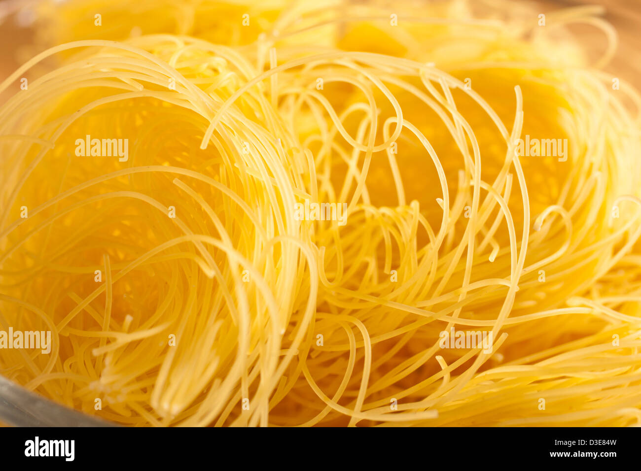 Angel Hair nidi, un tipo di pasta alimentare secca Foto Stock