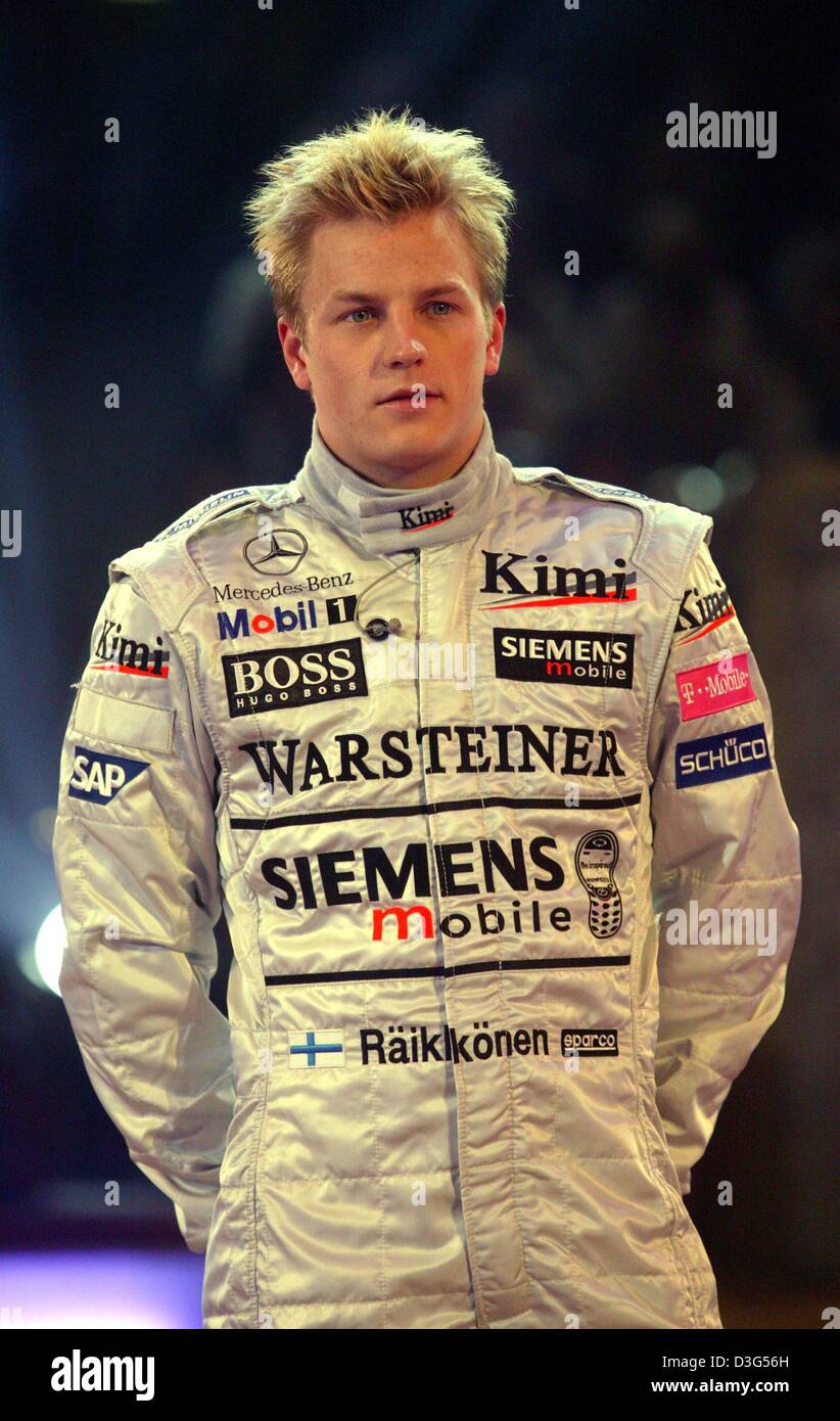 (Dpa) - Finlandese pilota di Formula Uno Kimi Raeikkoenen mostrato durante il circus show 'Stelle in arena' del Circus Krone a Monaco di Baviera, 6 dicembre 2003. Foto Stock