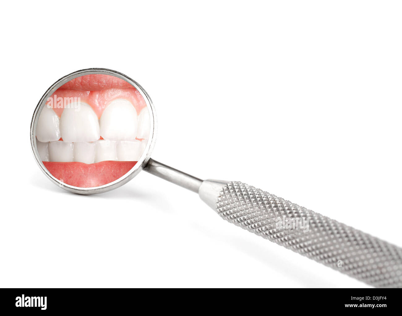Dentista con specchio di riflessione di denti Foto Stock