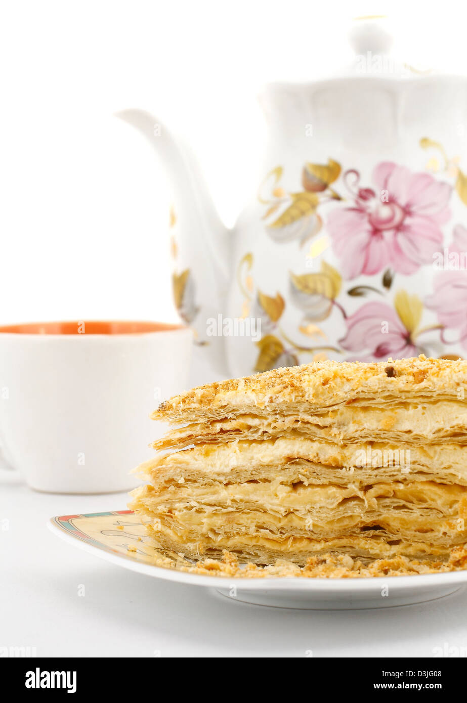 Fetta di miele e panna torta con sfondo Foto Stock