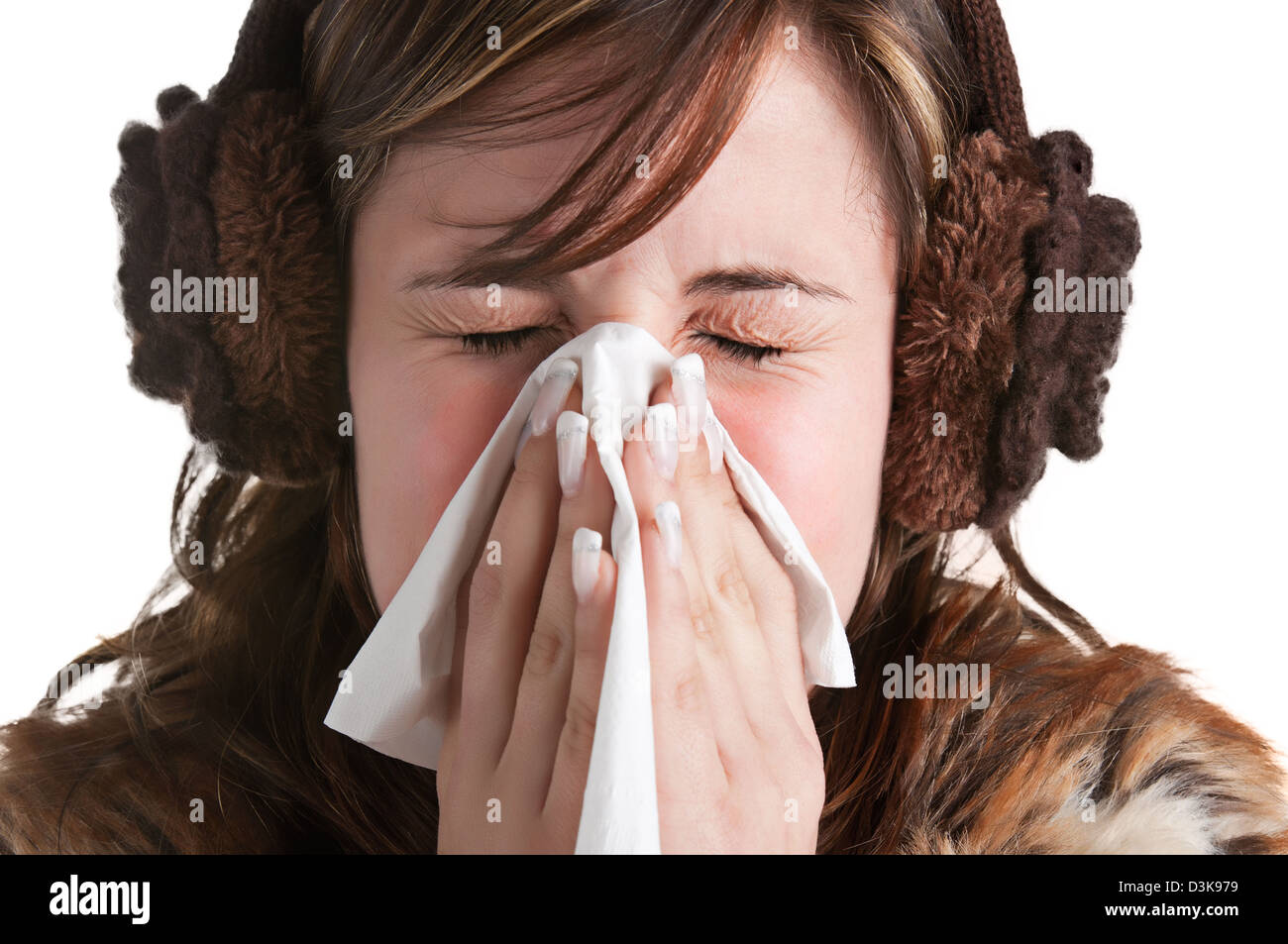 Pallida donna malata con un influenza, starnuti, in uno sfondo bianco Foto Stock