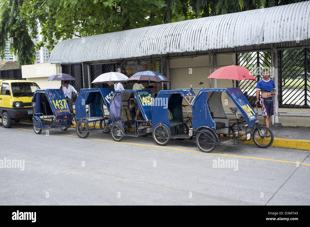 Pazienti pediatrici Cabs tricicli Taxi Manila Foto Stock
