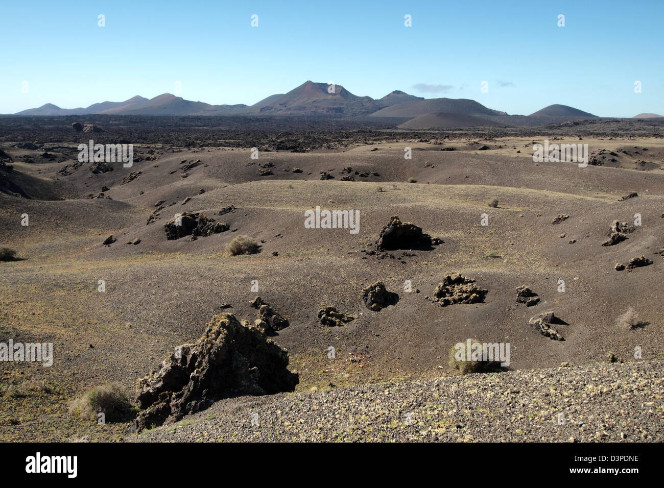 Vecchio essiccato il flusso di lava i campi di Timanfaya, Lanzarote Spagna Foto Stock