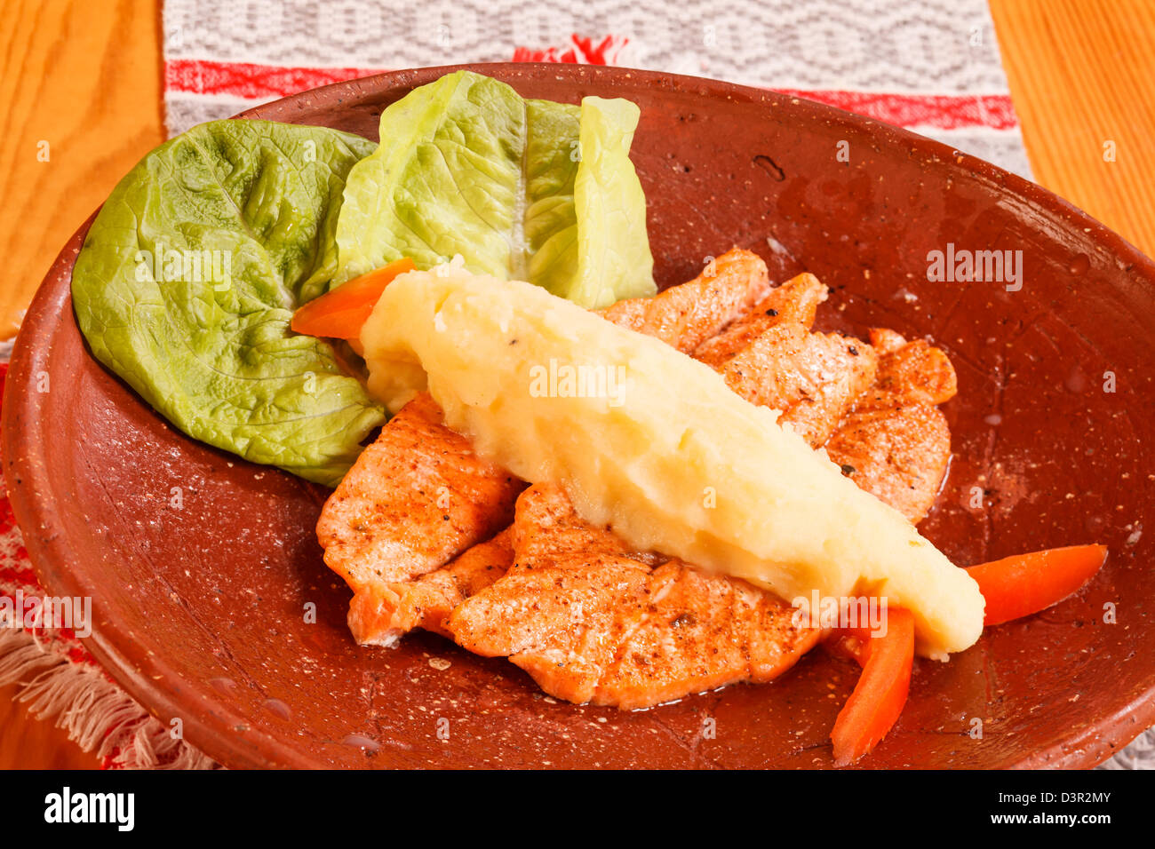Salmone e purè di patate Foto Stock