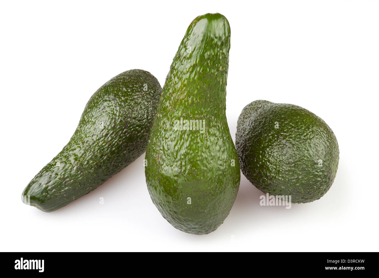 Avocado tre su sfondo bianco Foto Stock