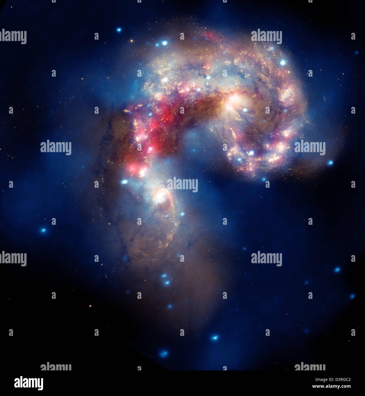 Un galattico spettacolo: una coppia di collisione di galassie circa 62 milioni di anni luce dalla Terra. Foto Stock