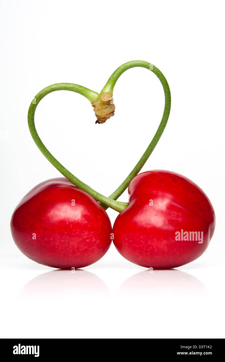 Freschi di ciliegia matura, formando una forma di cuore Foto Stock