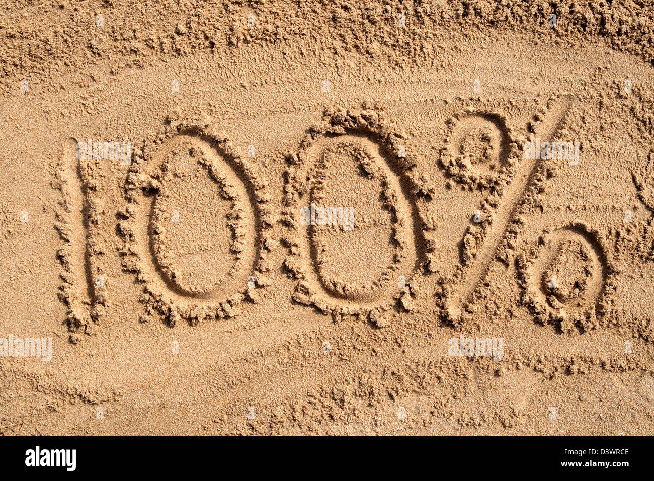 100% scritto su di una spiaggia di sabbia. Foto Stock