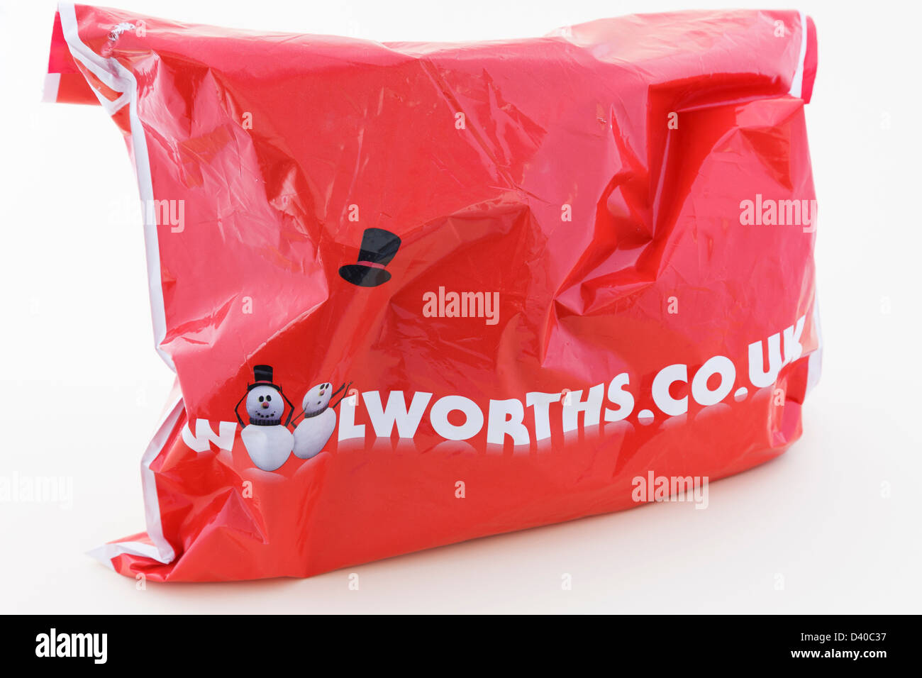Woolworths in plastica rosso borsa per lo shopping isolato su uno sfondo bianco Foto Stock