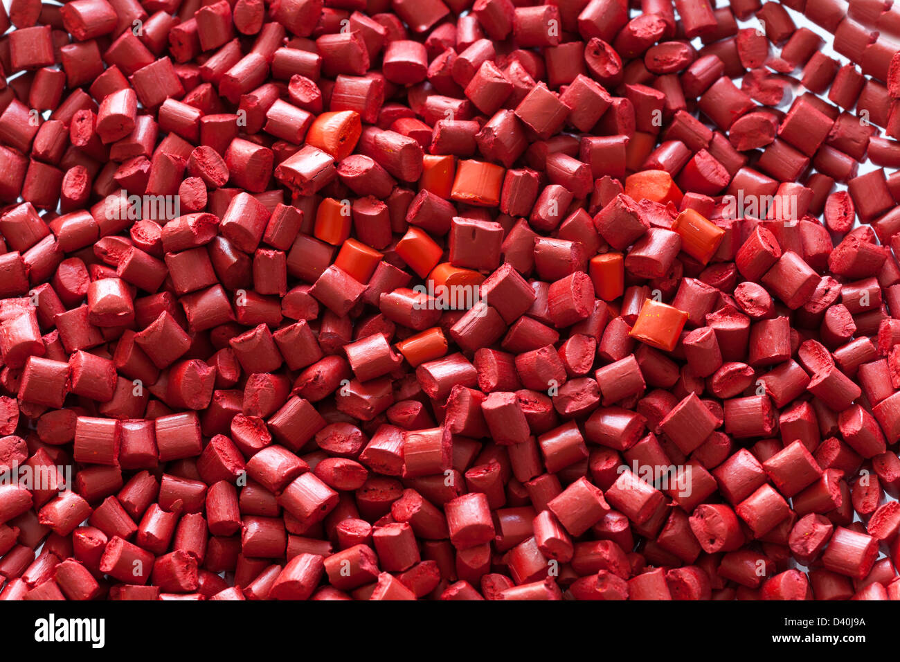 In plastica rosso granuli di mescola madre Foto Stock