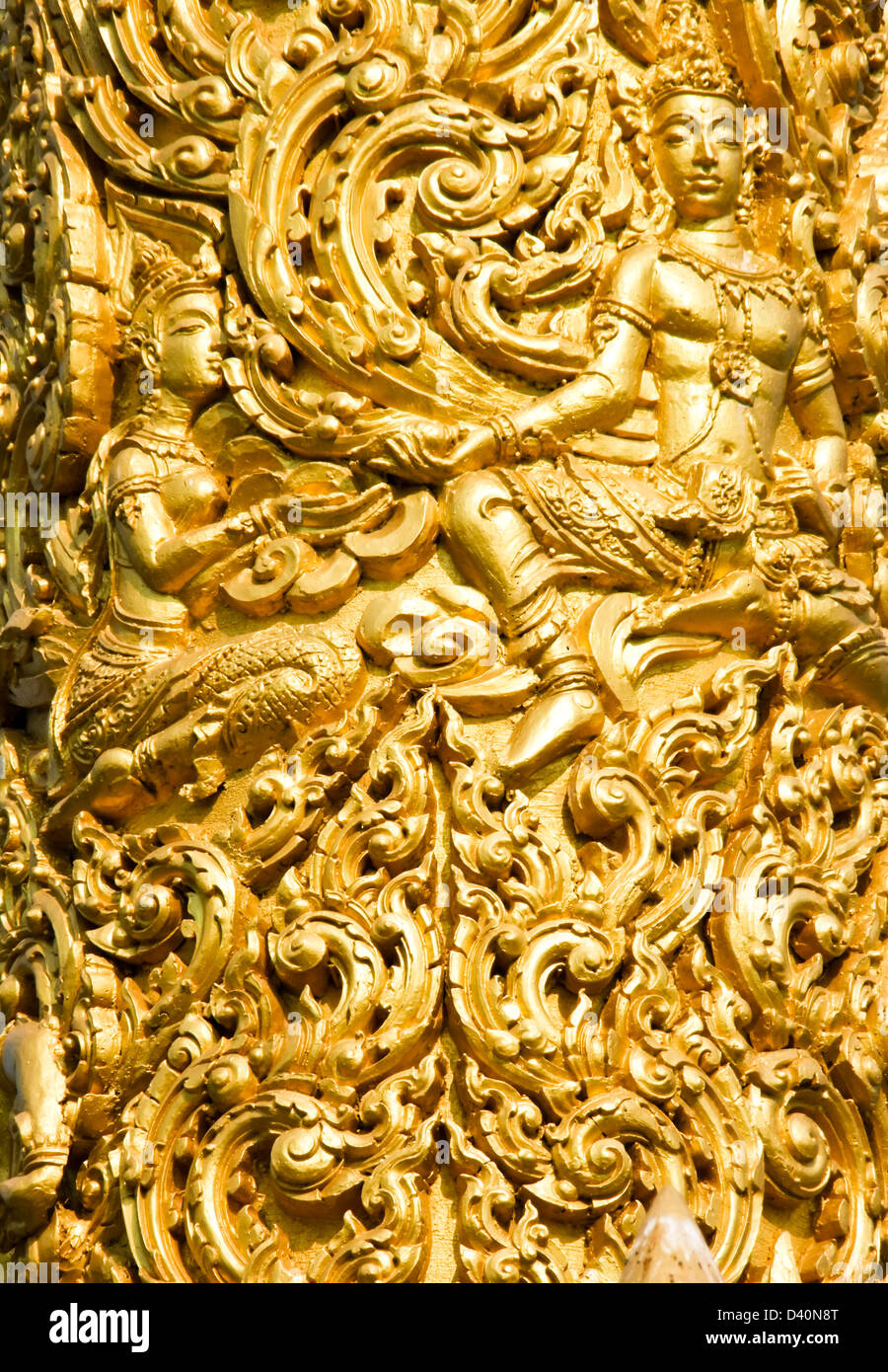 Primo piano della golden scultura di cera a Tung Sri Muang park di Ubon Ratchathani provincia, Thailandia Foto Stock