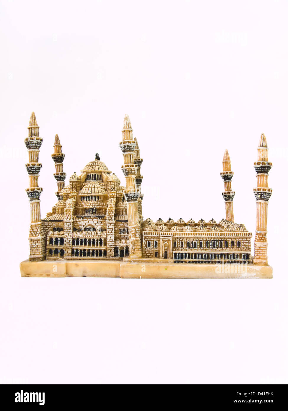 Una moschea blu modello in miniatura isolati su sfondo bianco, una delle icone di architettura islamica in Istanbul, Turchia Foto Stock