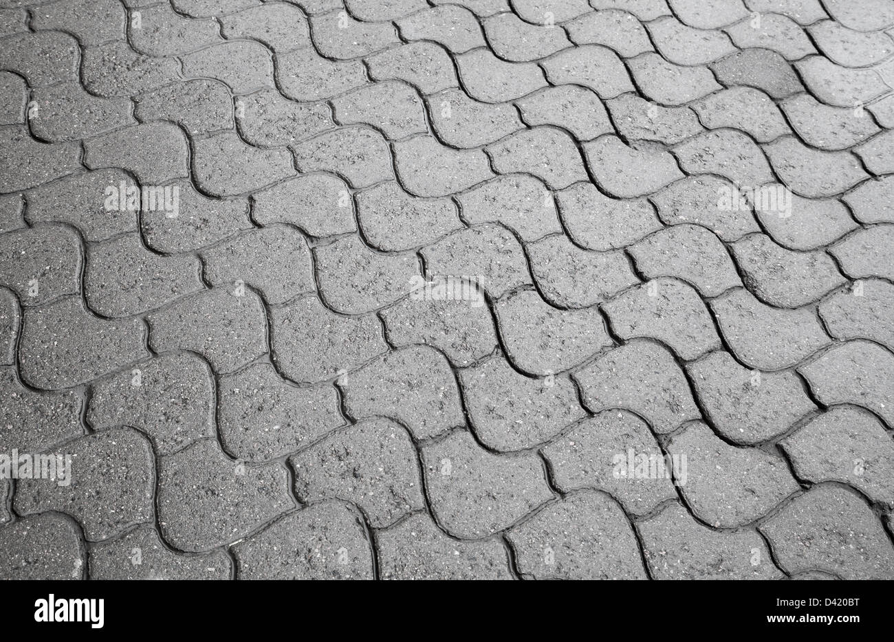 Texture di sfondo grigio di città strada acciottolata Foto Stock
