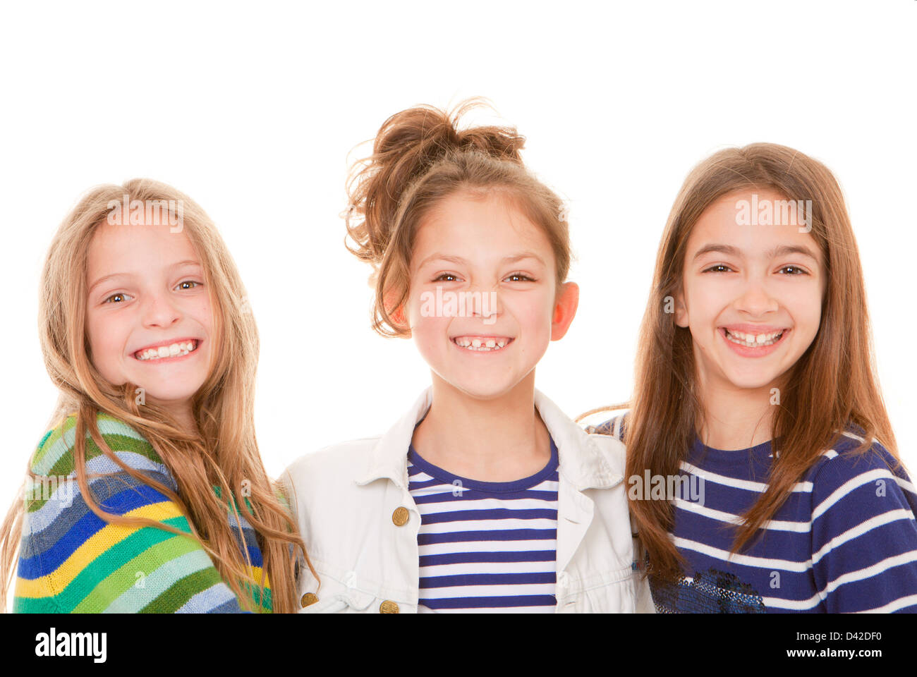 Un gruppo di bambini piccoli, ragazze o felici i bambini sorrisi Foto Stock