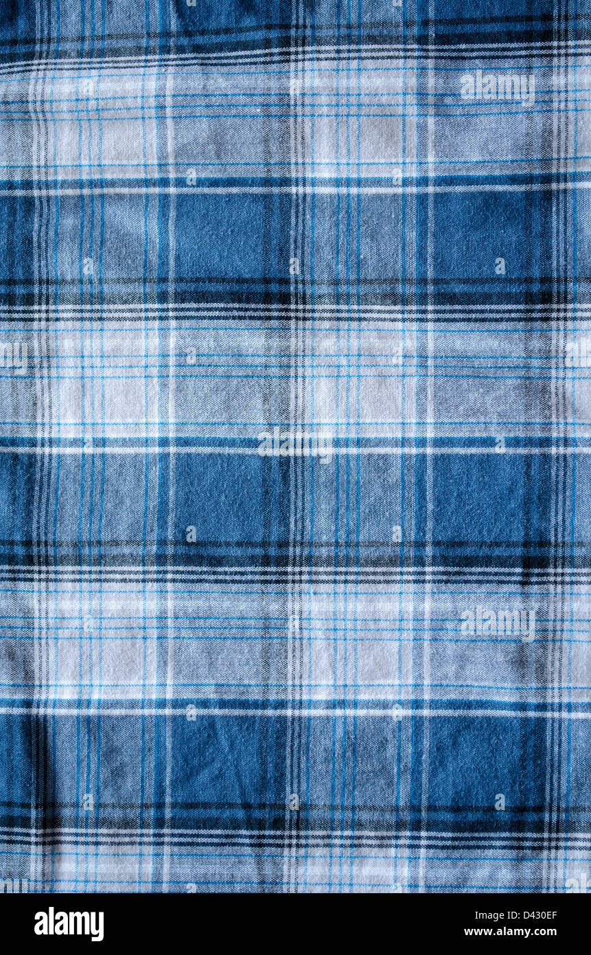 Primo piano della camicia in tessuto di cotone di materiale e forma quadrata ornamenti sfondo. Foto Stock