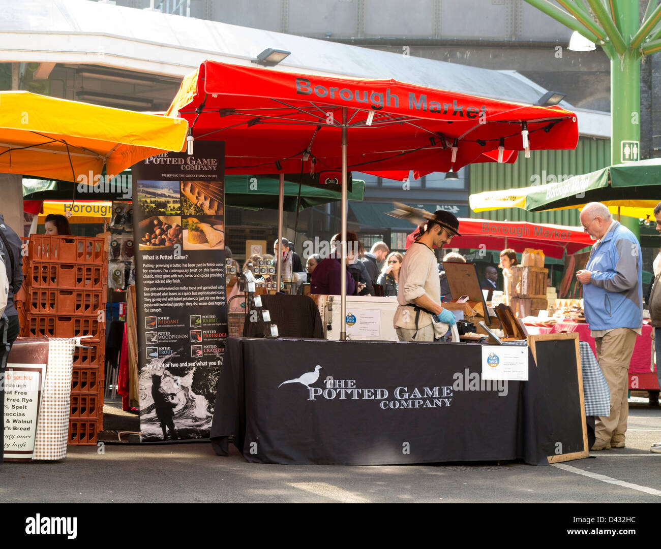 Potted gioco di stallo della società nel mercato di Borough, Londra Foto Stock