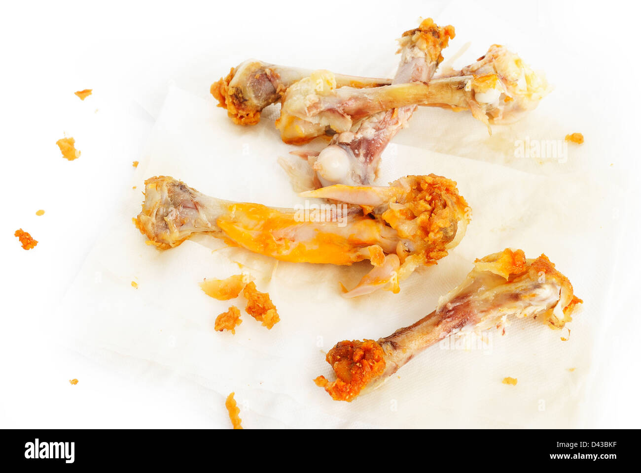 Osso del pollo sul tessuto di sfondo della carta Foto Stock