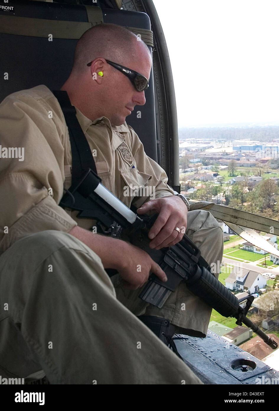 KatrinaFlight si riferisce alle forze dell'ordine federali coinvolte nella gestione dell'immigrazione e della sicurezza delle frontiere dopo l'uragano Katrina. Gli ispettori dell'immigrazione, la pattuglia di frontiera degli Stati Uniti e la protezione delle dogane e delle frontiere (CBP) hanno svolto un ruolo chiave nella risposta alle catastrofi e nella sicurezza delle frontiere in questo momento critico. Foto Stock