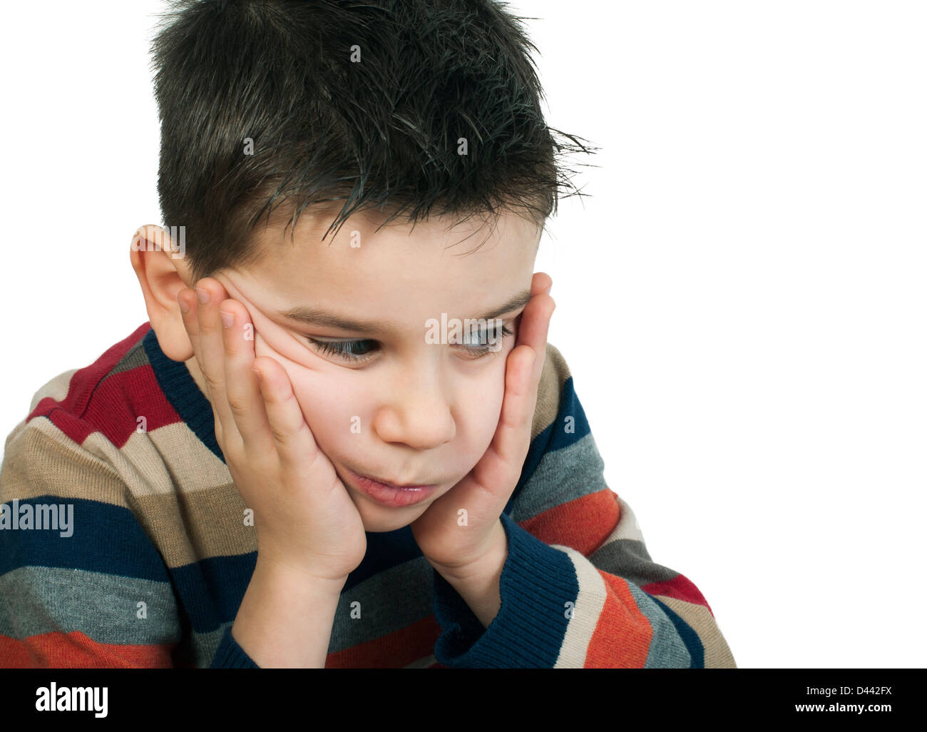 Triste bambino ha dei problemi.Bianco isolato studio shot Foto Stock