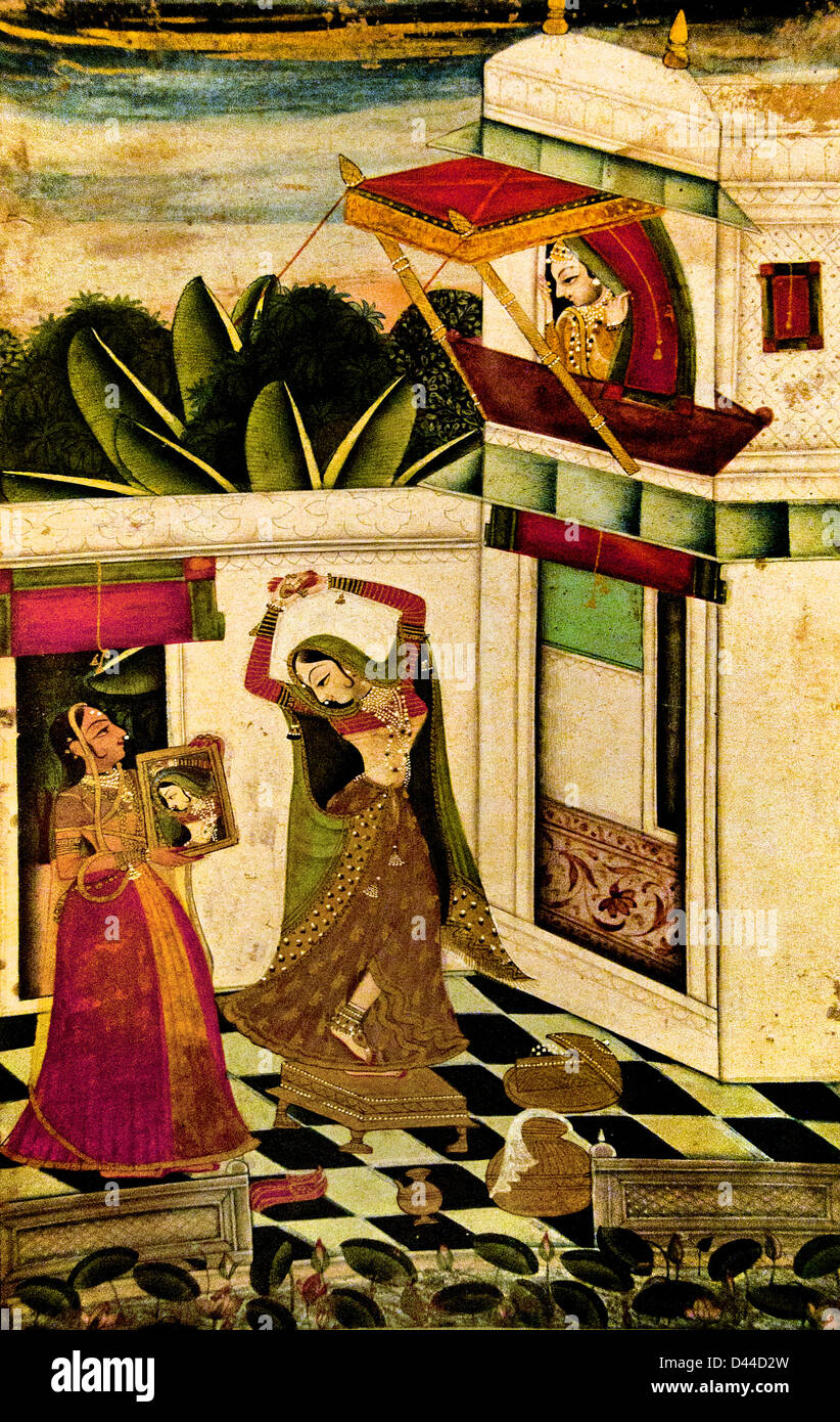 Signora guardando a se stessa nello specchio del xviii secolo Bundi del Rajasthan Rajasthan in India Foto Stock