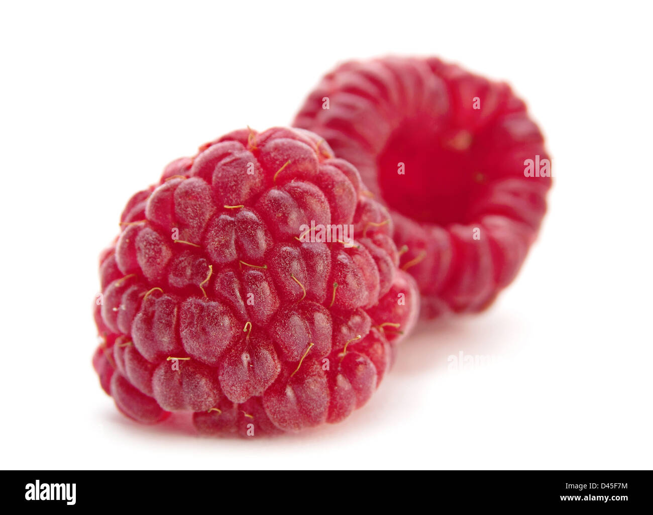 Frutta lampone macro isolati su sfondo bianco Foto Stock