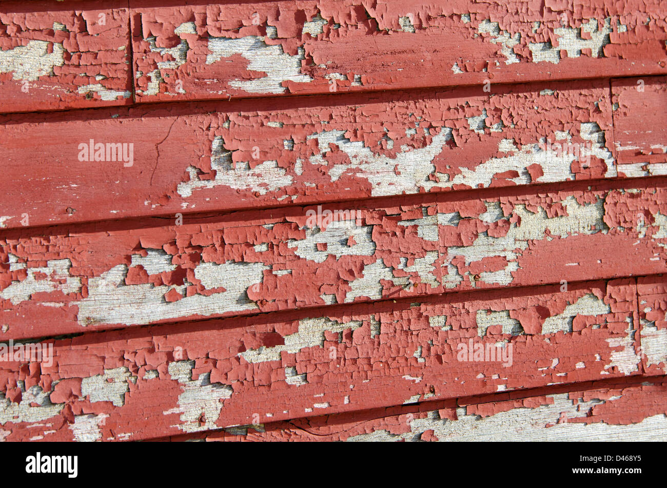La vernice rossa la pelatura di infissi in legno rivestimenti Foto Stock