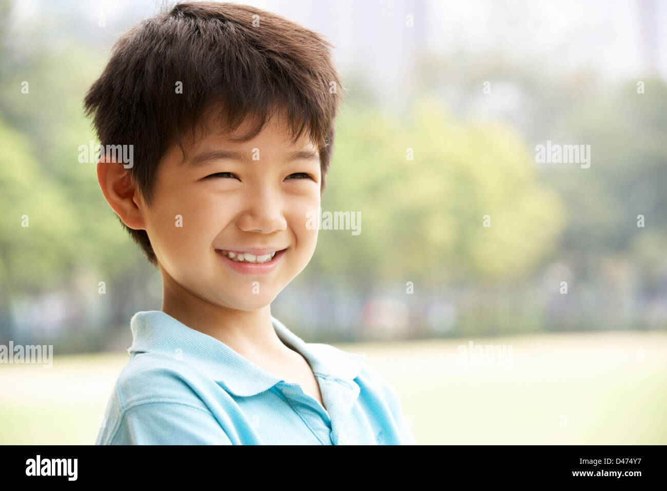 Testa e spalle Ritratto di ragazzo cinese Foto Stock