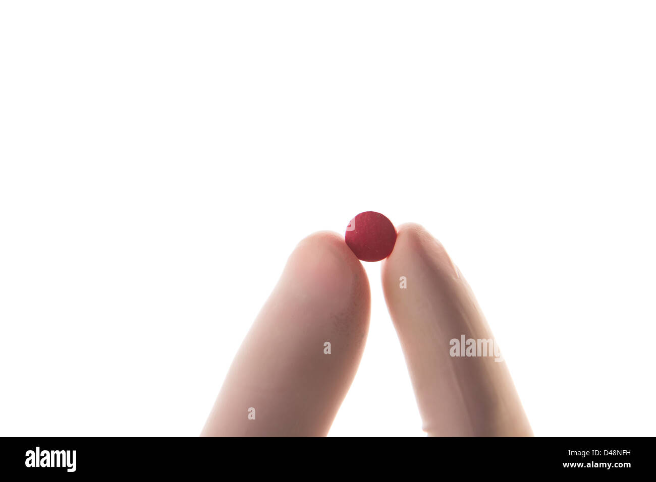 La mano guantata azienda red tablet Foto Stock