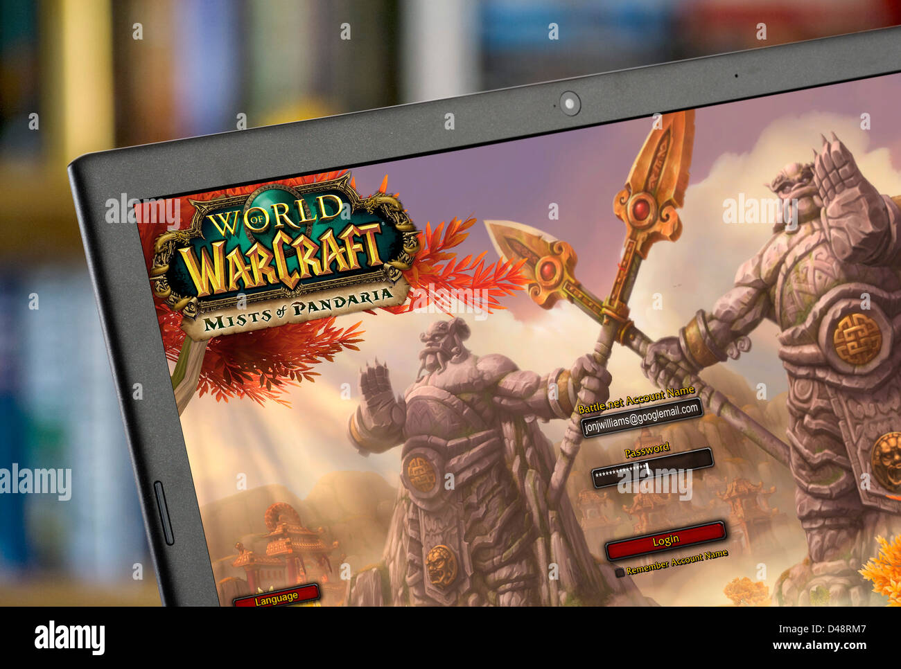 Accesso al popolare World of Warcraft (nebbie di Pandaria) gioco su un computer portatile Foto Stock