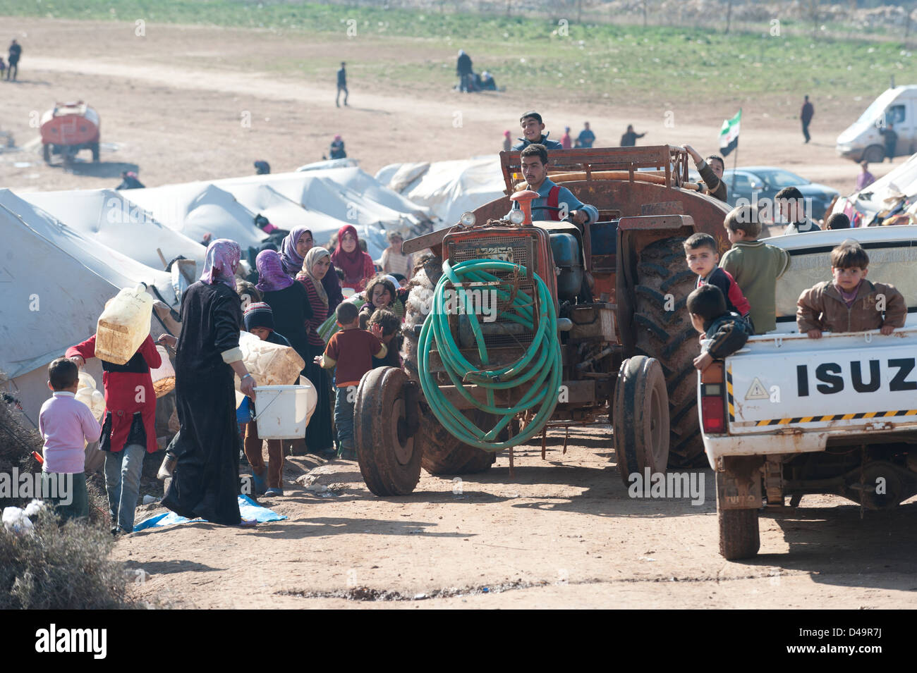 Un serbatoio carrello con acqua potabile nell'Atma Campo profughi ai confini con la Turchia e la Siria Foto Stock