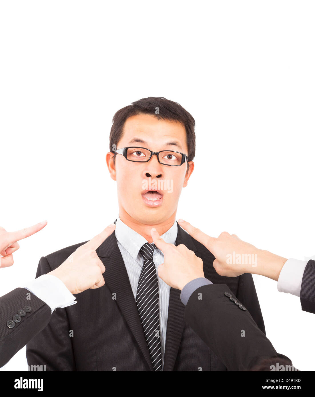 Tutte le mani puntando verso sorpreso imprenditore Foto Stock