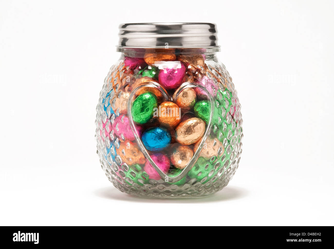 Io amo le uova di pasqua nel cuore di vetro a forma di vaso di storage Foto Stock