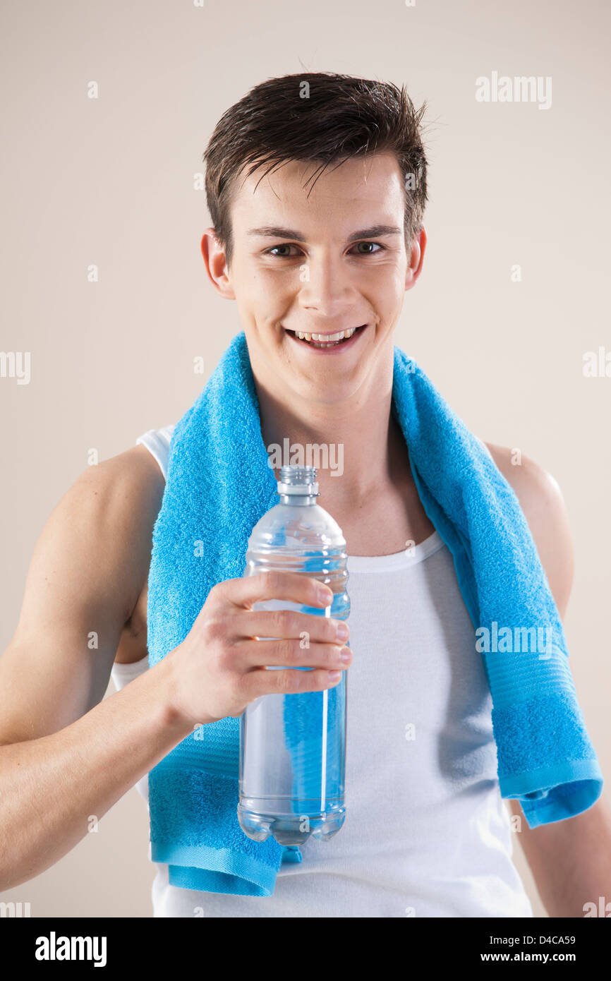 Giovane con waterbottle Foto Stock