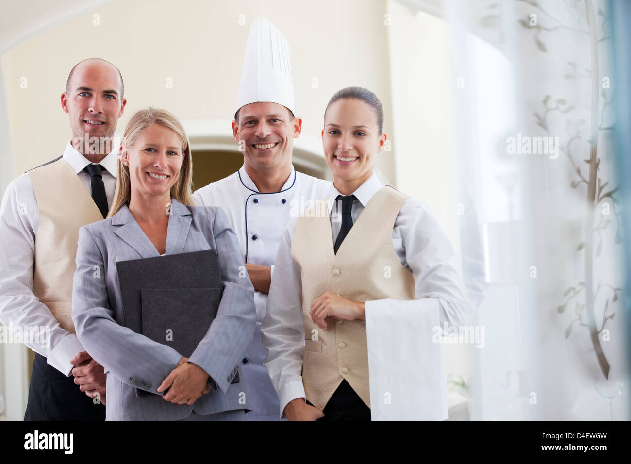Il personale sorrideva sempre nel ristorante Foto Stock