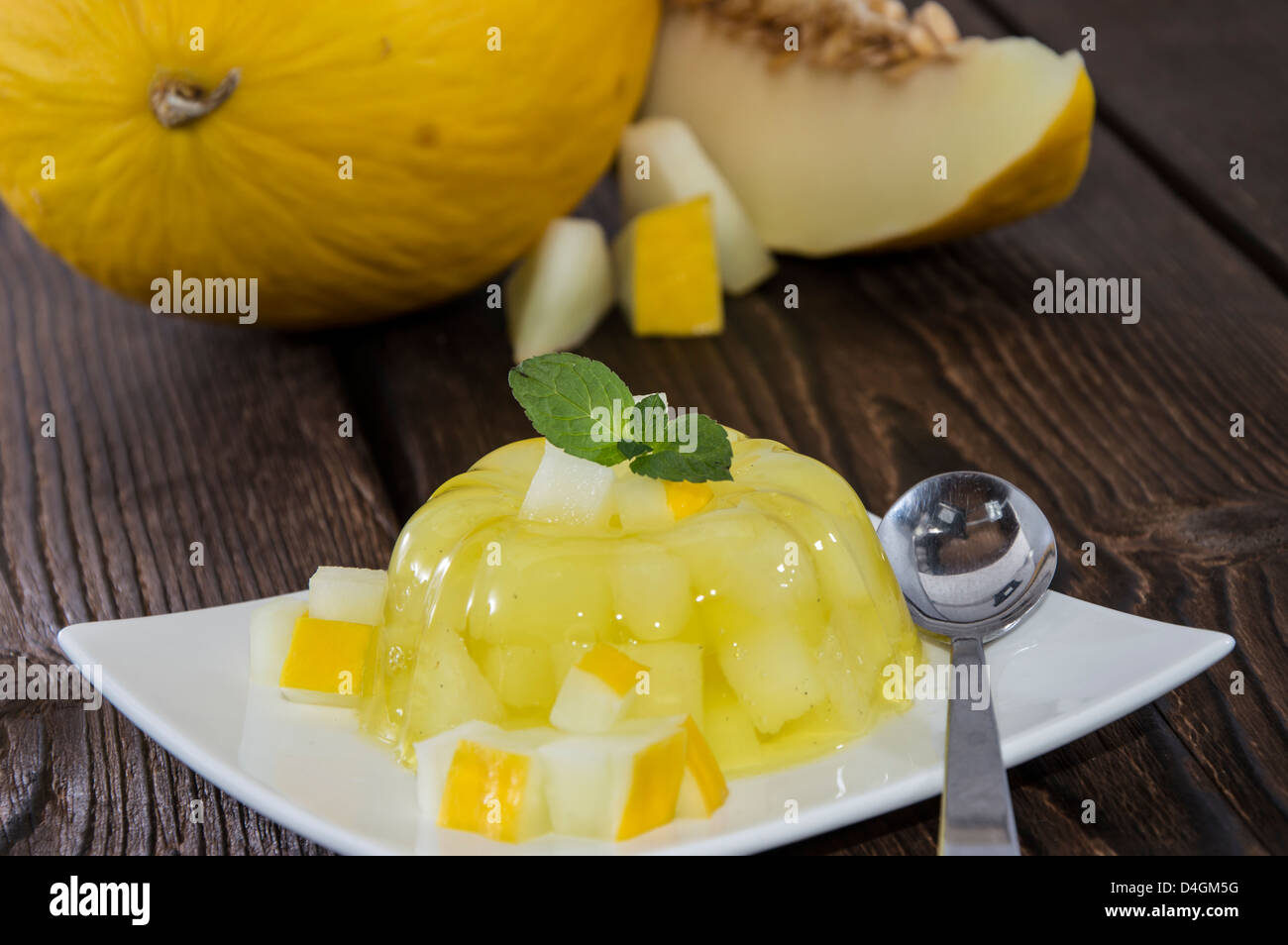 Fresche fatte melata jella su sfondo di legno Foto Stock