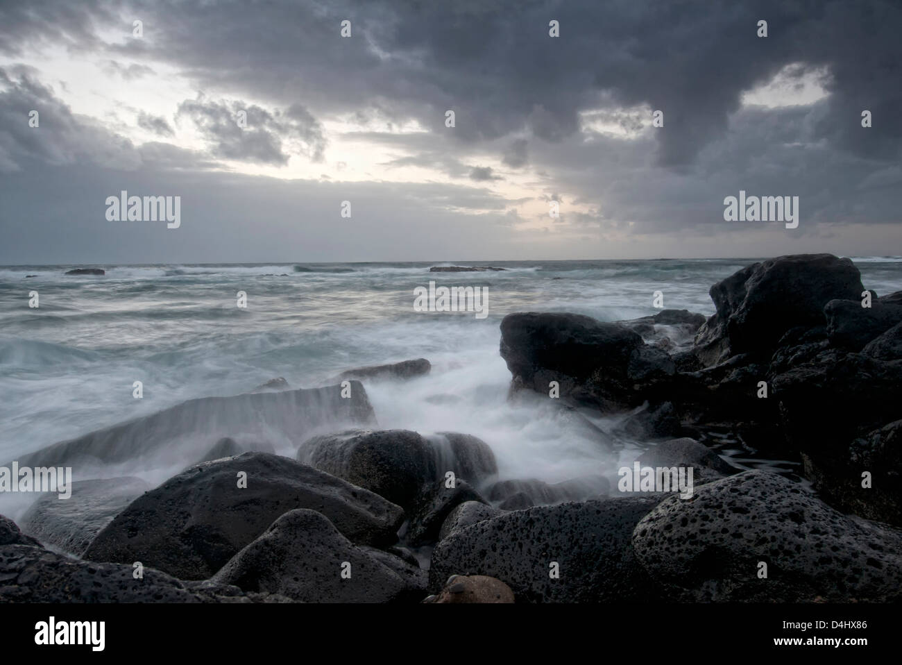 Una lunga esposizione fotografia di El Cotillo a Fuerteventura al crepuscolo Foto Stock