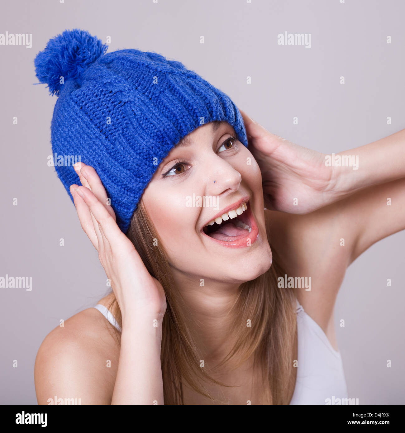 La donna in un blue hat Foto Stock