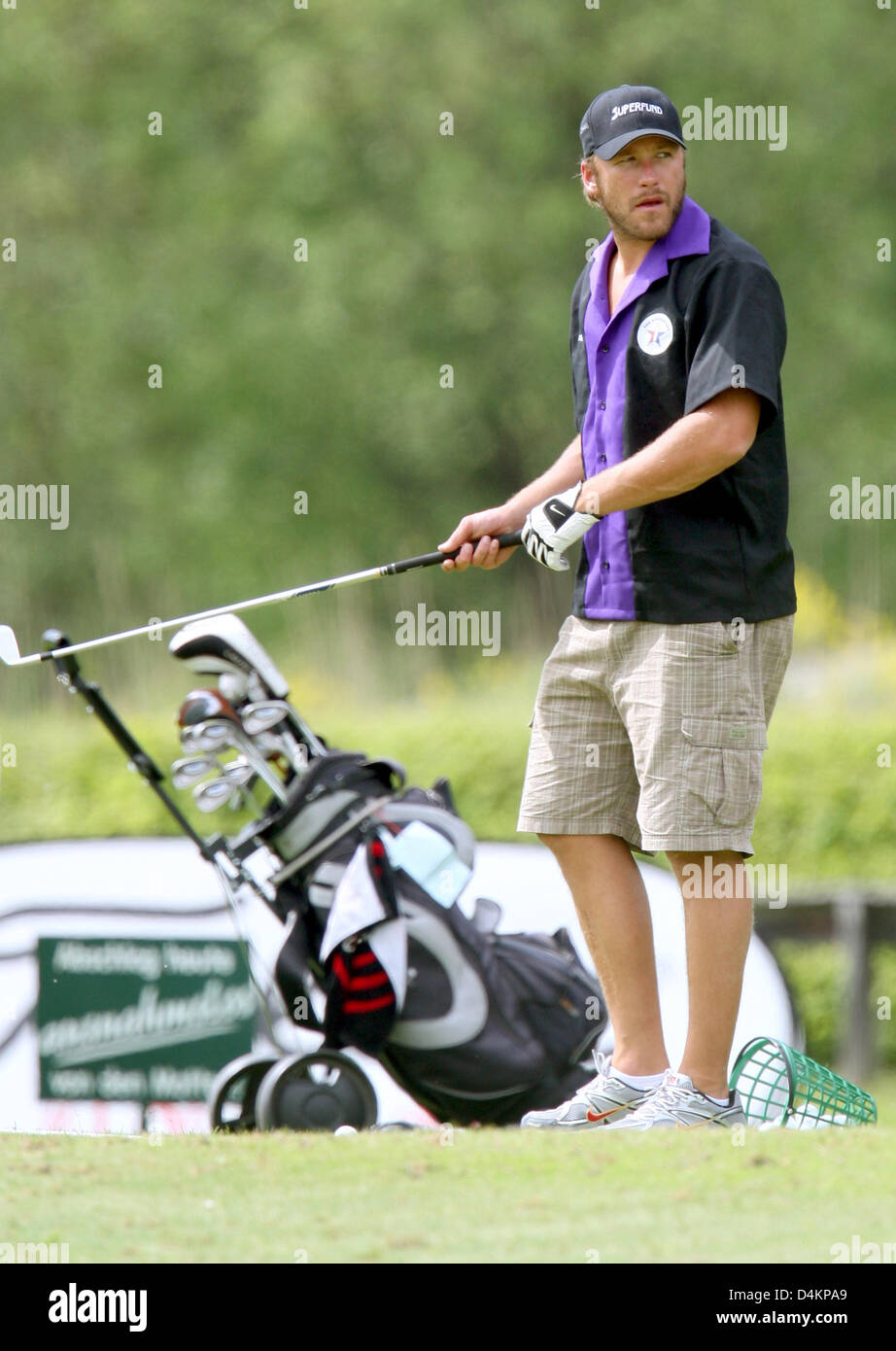 Siamo ski racer Bode Miller pratiche unità del driving range del campo da golf di Zell am See, Austria, 14 maggio 2009. Bode Miller partecipa al UVEX &Sci Golf Campionati del Mondo 2009 che avvengono in Zell am See dal 14 maggio fino al 17 maggio 2009. Il concorso è composto da un slalom gigante e due round di golf. Foto: Karl-Josef Hildenbrand Foto Stock
