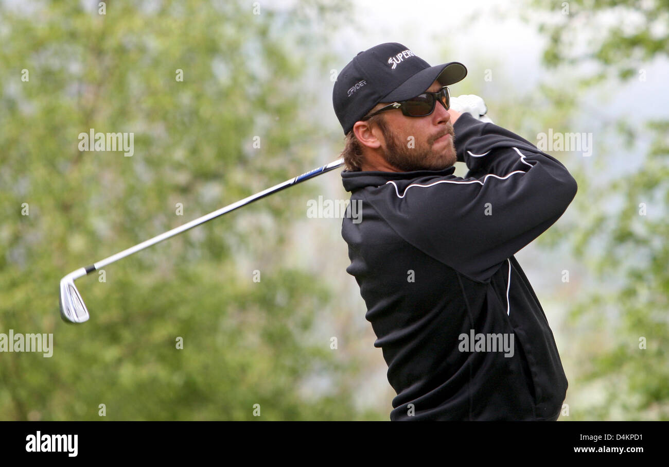 Siamo ski racer Bode Miller colpisce la palla sul campo da golf di Zell am See, Austria, 15 maggio 2009. Bode Miller partecipa al UVEX &Sci Golf Campionati del Mondo 2009 che avvengono in Zell am See dal 14 maggio fino al 17 maggio 2009. Il concorso è composto da un slalom gigante e due round di golf. Foto: Karl-Josef Hildenbrand Foto Stock