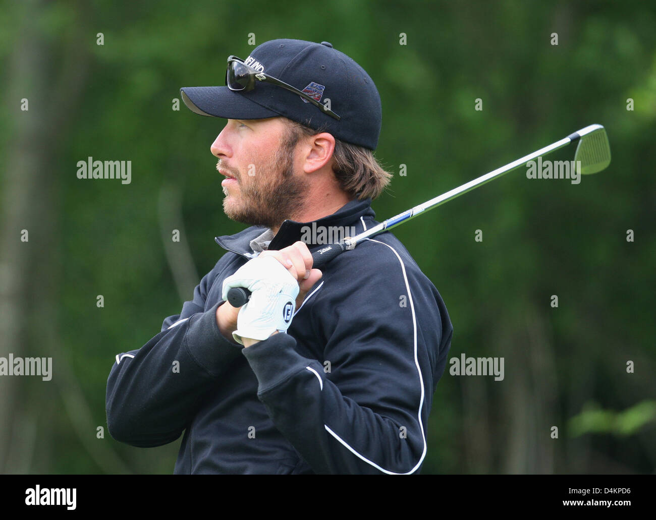 Siamo ski racer Bode Miller detiene un club di golf sul campo da golf di Zell am See, Austria, 15 maggio 2009. Bode Miller partecipa al UVEX &Sci Golf Campionati del Mondo 2009 che avvengono in Zell am See dal 14 maggio fino al 17 maggio 2009. Il concorso è composto da un slalom gigante e due round di golf. Foto: Karl-Josef Hildenbrand Foto Stock