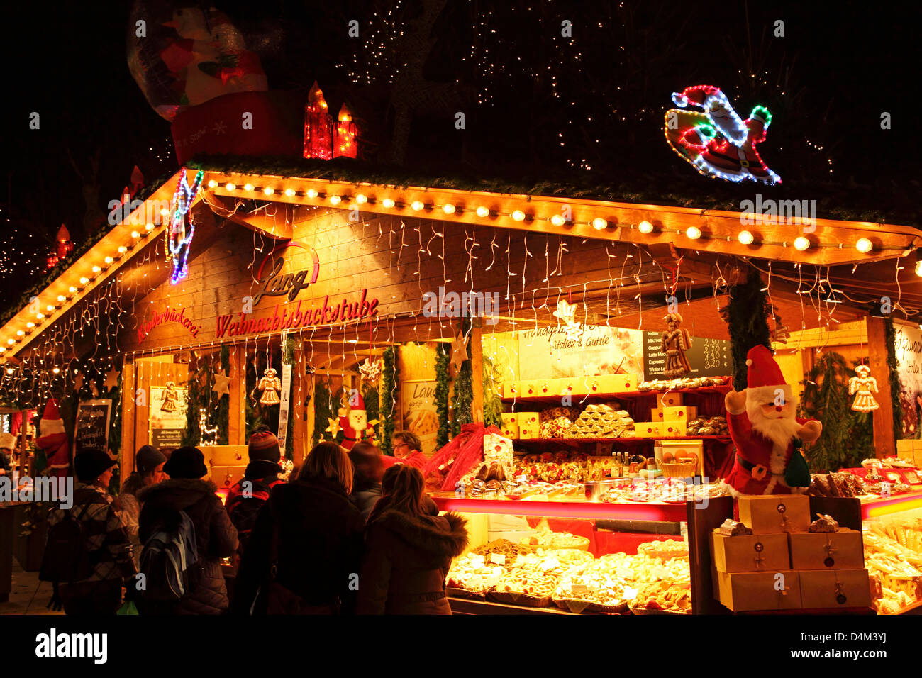 Baker stallo presso il Mercato di Natale (Weihnachtsmarkt) a Stoccarda in Germania. Foto Stock