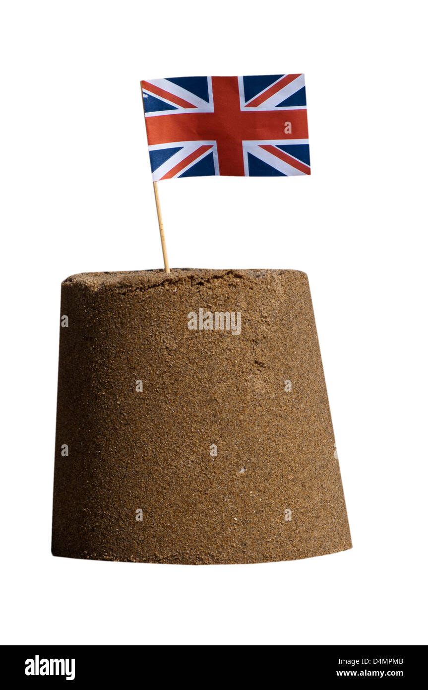 Sandcastle con un Union Jack Flag Foto Stock